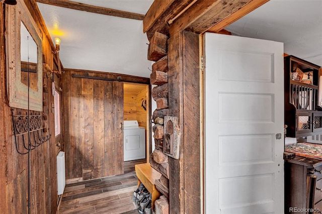 500 Fourth St, Fairplay, CO 80440 - hallway featuring washer / clothes dryer, wood finished floors, wood walls, and radiator heating unit