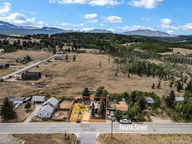 500 Fourth St, Fairplay, CO 80440 - aerial view of property and surrounding area with a mountain backdrop and property boundaries highlighted