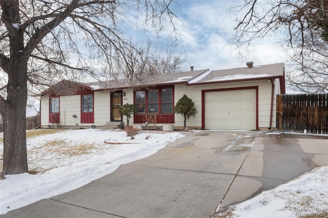 ranch-style home featuring a garage