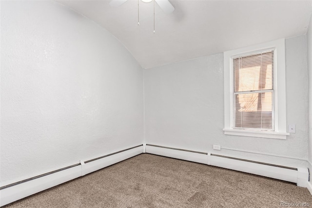 empty room with carpet flooring, ceiling fan, lofted ceiling, and a baseboard radiator