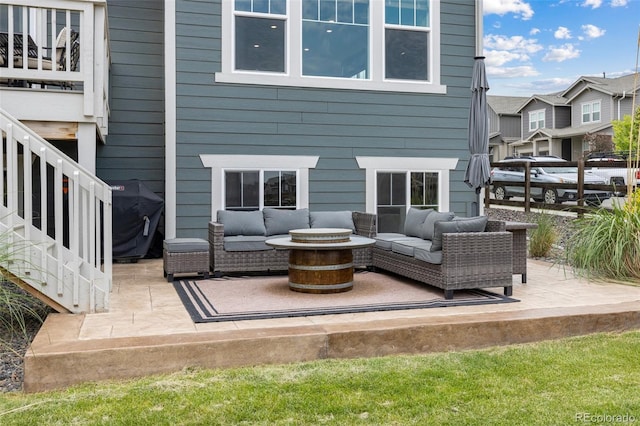 12940 Brier Ct, Firestone, CO 80504 - back of house with outdoor lounge area, stairs, a patio, and a residential view