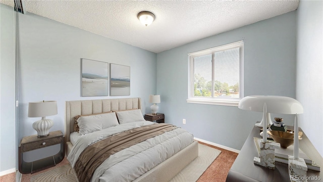 4396 Dearborn St, Denver, CO 80239 - carpeted bedroom featuring a textured ceiling and baseboards