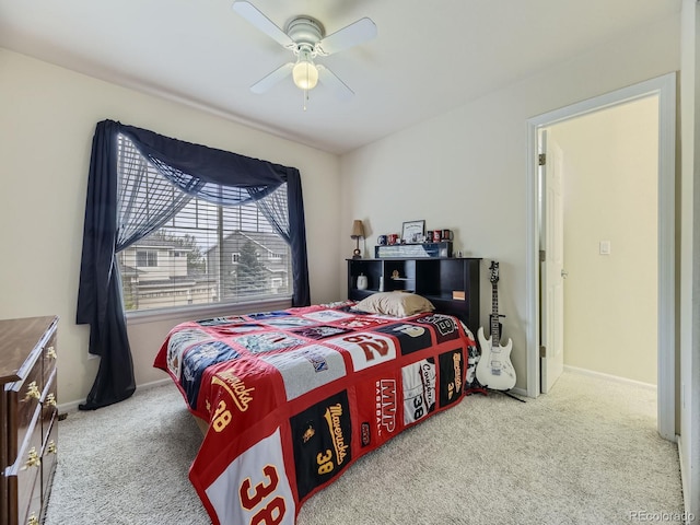 carpeted bedroom featuring ceiling fan