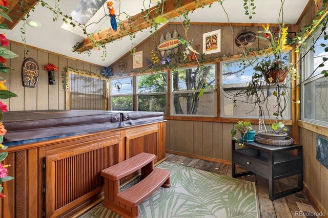 1760 W 74th Way, Denver, CO 80221 - sunroom with a hot tub, wood walls, and vaulted ceiling