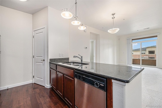 4100 Albion St Unit 617, Denver, CO 80216 - kitchen featuring stainless steel dishwasher, a sink, a peninsula, dark wood-style flooring, and dark stone countertops