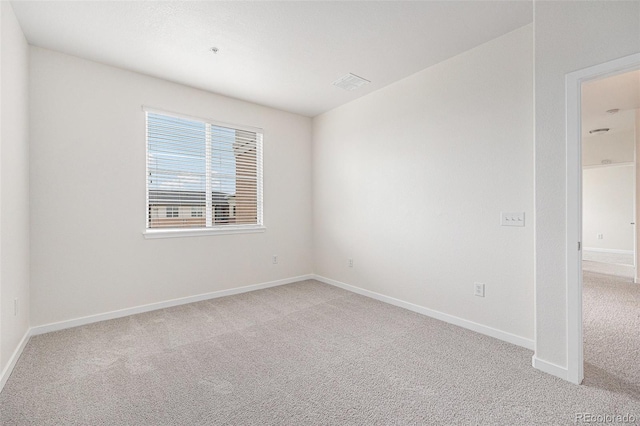 4100 Albion St Unit 617, Denver, CO 80216 - spare room with light colored carpet and baseboards