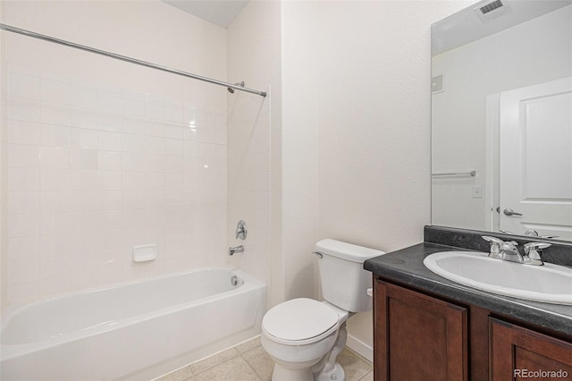 4100 Albion St Unit 617, Denver, CO 80216 - bathroom featuring toilet, vanity, shower / bath combination, and tile patterned flooring
