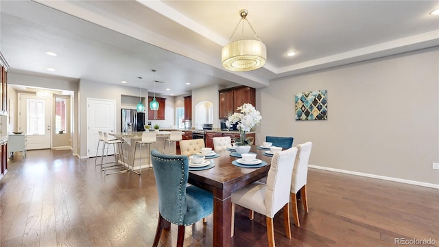 18009 E 47th Pl, Denver, CO 80249 - dining room with baseboards, dark wood finished floors, and recessed lighting