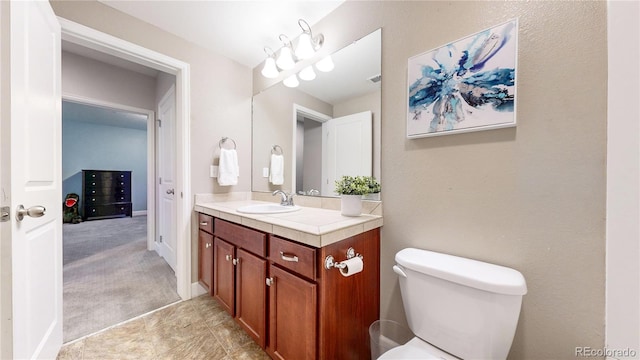 18009 E 47th Pl, Denver, CO 80249 - bathroom with vanity and toilet