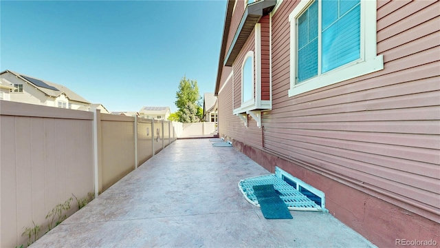 18009 E 47th Pl, Denver, CO 80249 - view of side of home with a patio