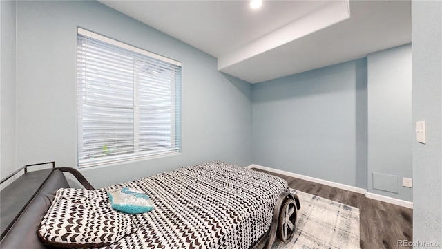 18009 E 47th Pl, Denver, CO 80249 - bedroom featuring wood finished floors and baseboards