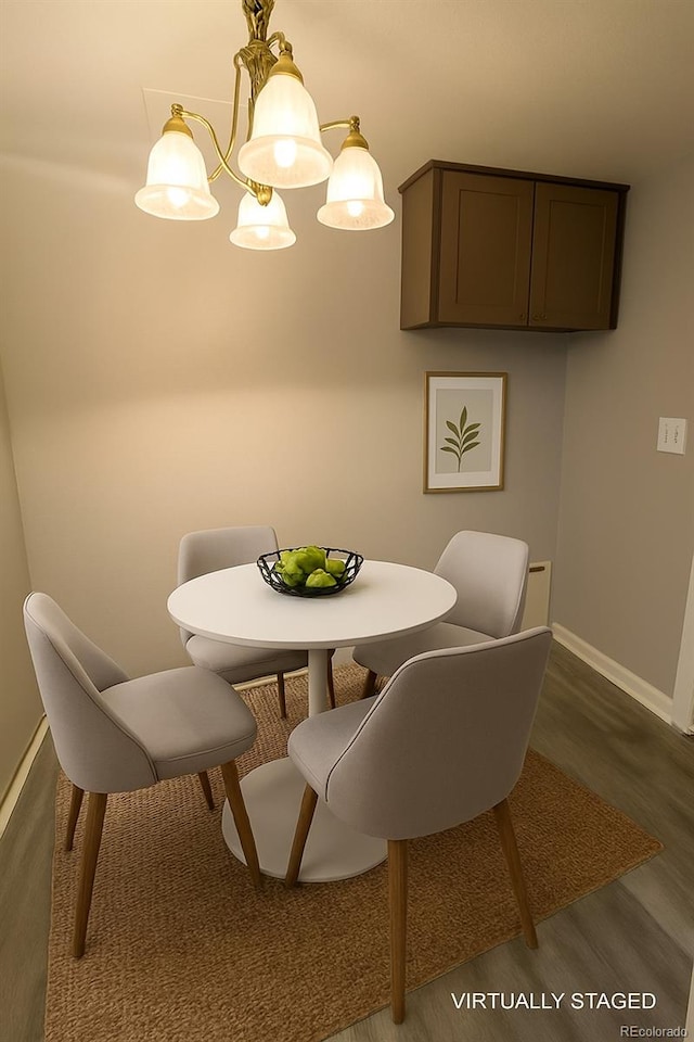 3345 W Evans Ave, Denver, CO 80219 - dining space with wood finished floors and baseboards