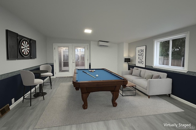 3345 W Evans Ave, Denver, CO 80219 - recreation room with an AC wall unit, wood finished floors, french doors, and billiards table