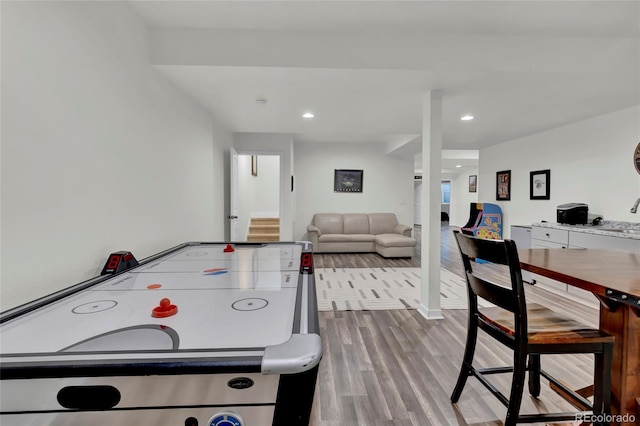 playroom featuring recessed lighting and wood finished floors
