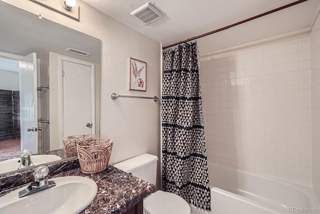 3050 W 32nd Ave Unit 202C, Denver, CO 80211 - full bath with vanity, toilet, a textured wall, and shower / tub combo with curtain