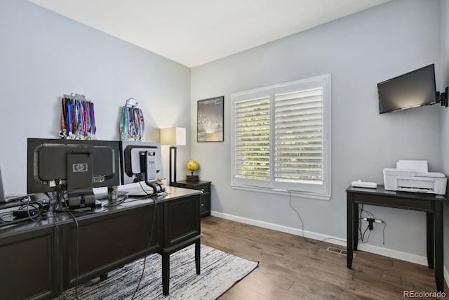 19653 E Ida Dr, Aurora, CO 80015 - home office featuring wood finished floors and baseboards