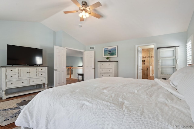 19653 E Ida Dr, Aurora, CO 80015 - bedroom with vaulted ceiling, wood finished floors, ensuite bathroom, and ceiling fan