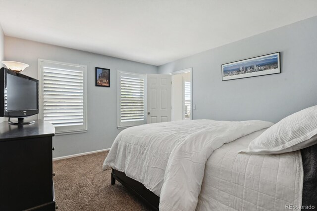19653 E Ida Dr, Aurora, CO 80015 - bedroom with carpet floors and baseboards