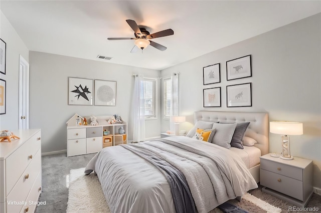 bedroom with carpet, visible vents, baseboards, and a ceiling fan