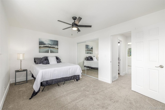2232 Coronado Pkwy Unit B, Denver, CO 80229 - bedroom with light colored carpet, a closet, and ceiling fan