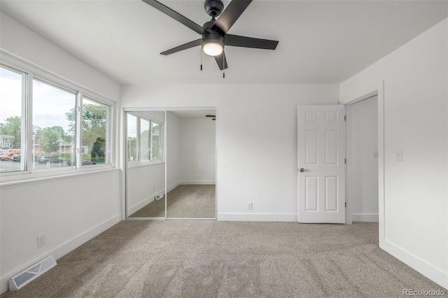 2232 Coronado Pkwy Unit B, Denver, CO 80229 - unfurnished bedroom featuring carpet floors, a closet, and ceiling fan