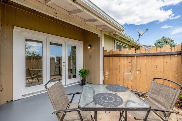 2232 Coronado Pkwy Unit B, Denver, CO 80229 - view of patio / terrace featuring french doors and outdoor dining area