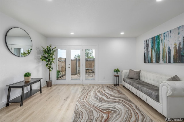 2232 Coronado Pkwy Unit B, Denver, CO 80229 - living room featuring wood finished floors, recessed lighting, and french doors