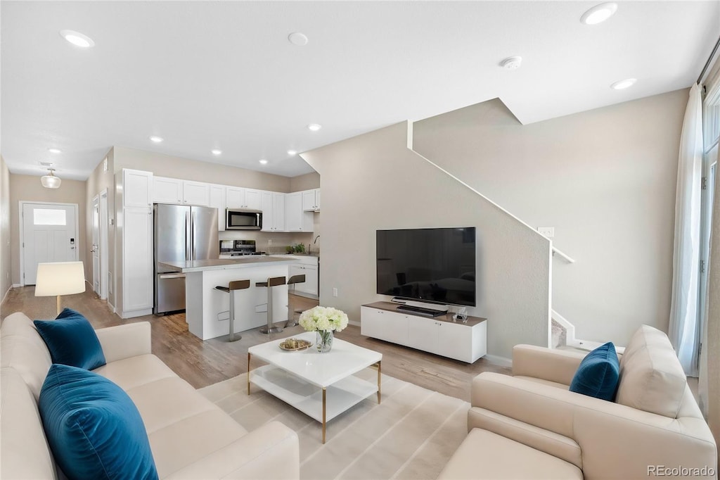 living room featuring light hardwood / wood-style flooring