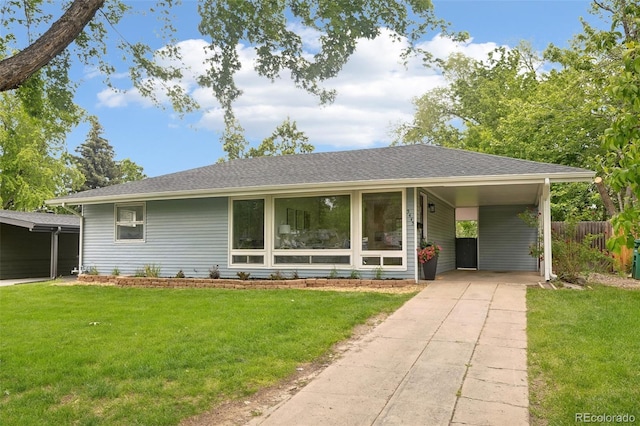 5445 Nebraska Way, Denver, CO 80246 - view of front of property with concrete driveway and an attached carport