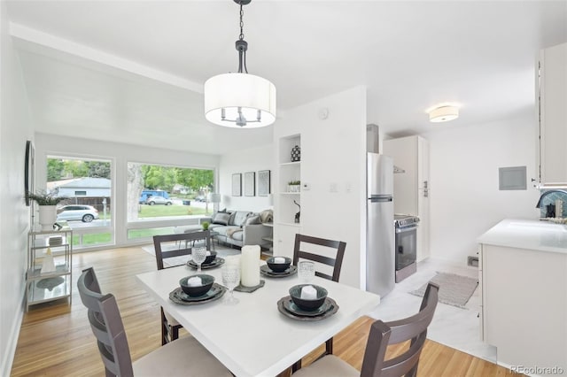 5445 Nebraska Way, Denver, CO 80246 - dining area with light wood finished floors