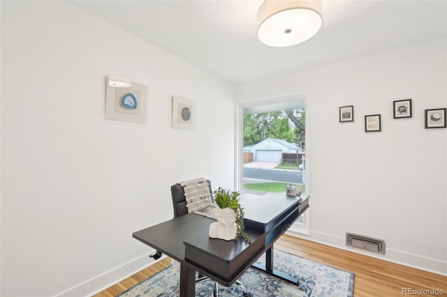 5445 Nebraska Way, Denver, CO 80246 - office area with baseboards and wood finished floors