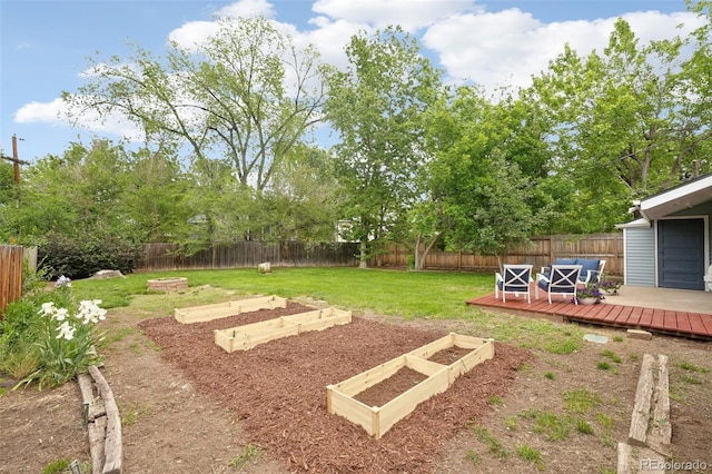 5445 Nebraska Way, Denver, CO 80246 - view of yard with a deck and a garden