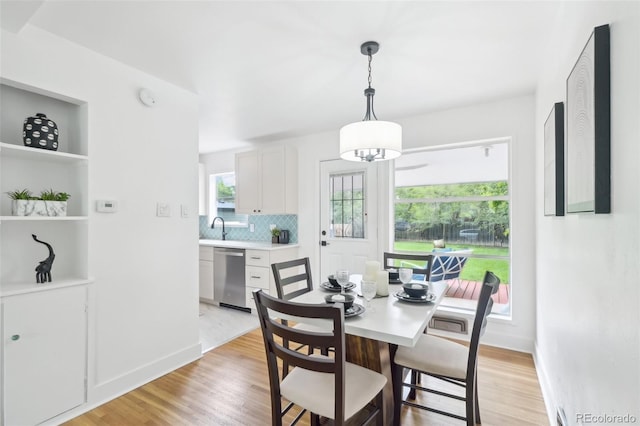 5445 Nebraska Way, Denver, CO 80246 - dining space featuring light wood finished floors and baseboards