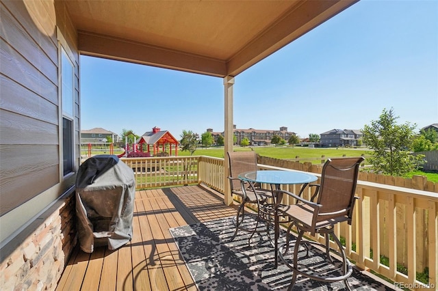 wooden deck featuring a residential view