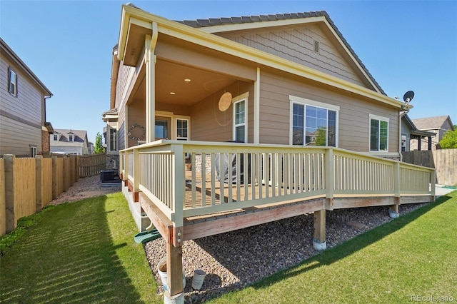 back of property with a wooden deck