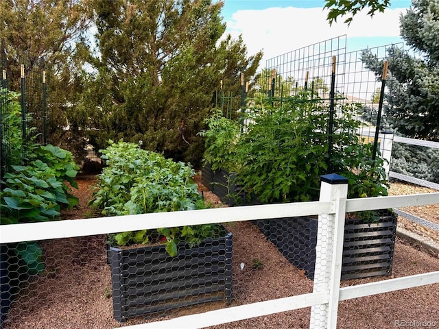 view of gate featuring fence