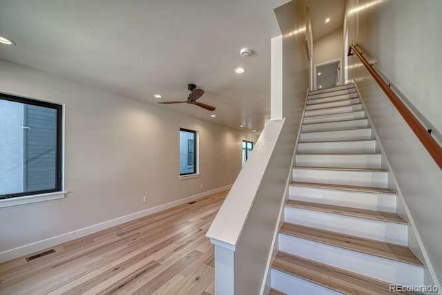 136 Chase St, Salida, CO 81201 - stairs with wood finished floors, a ceiling fan, and recessed lighting