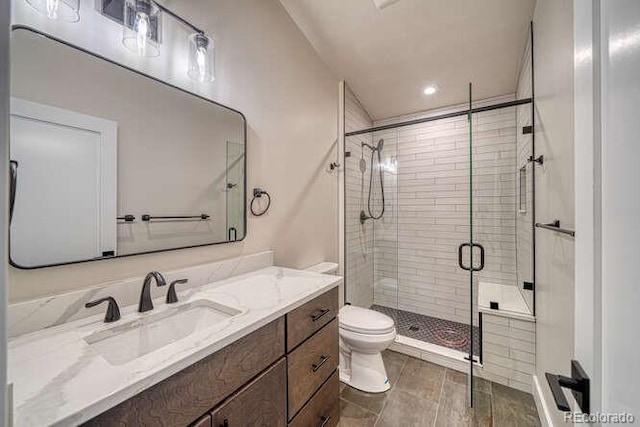 136 Chase St, Salida, CO 81201 - bathroom with vanity, a shower stall, and recessed lighting