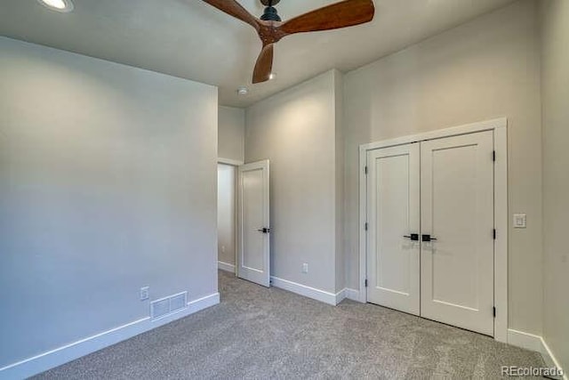 136 Chase St, Salida, CO 81201 - unfurnished bedroom with light colored carpet, recessed lighting, a closet, and a ceiling fan