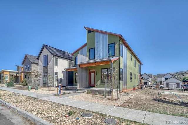 136 Chase St, Salida, CO 81201 - modern home featuring a residential view and a porch