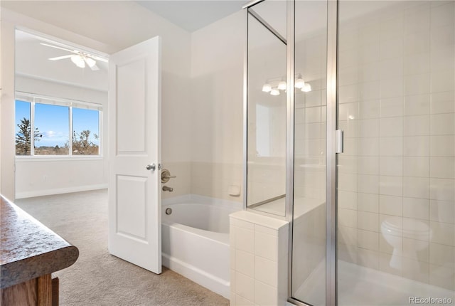 bathroom featuring separate shower and tub, ceiling fan, and vanity