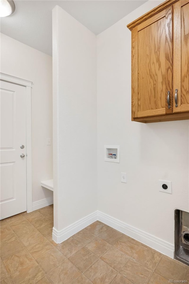 laundry area with washer hookup, cabinets, and electric dryer hookup