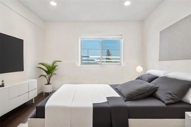 bedroom featuring dark wood-type flooring