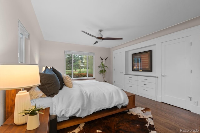 bedroom featuring wood finished floors and ceiling fan