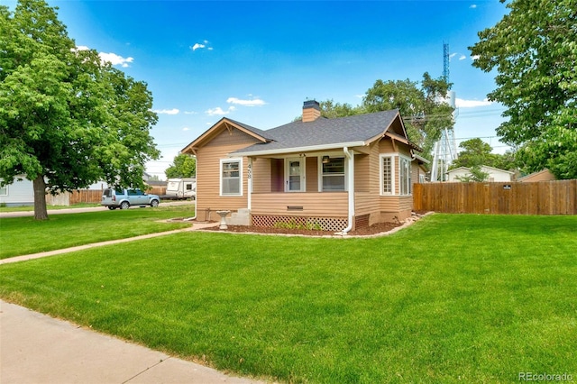 458 Cherry St, Hudson, CO 80642 - bungalow with crawl space, a chimney, roof with shingles, and a porch