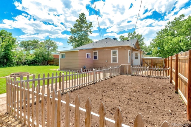 458 Cherry St, Hudson, CO 80642 - rear view of house featuring a fenced backyard