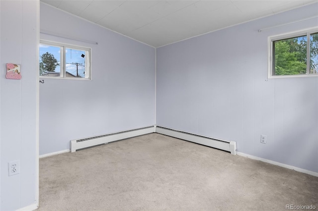 458 Cherry St, Hudson, CO 80642 - carpeted spare room with a baseboard heating unit