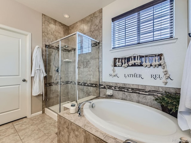 16658 Prospect Ln, Broomfield, CO 80023 - full bathroom with a garden tub, a shower stall, and tile patterned flooring