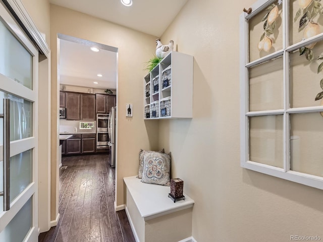 16658 Prospect Ln, Broomfield, CO 80023 - corridor featuring dark wood-style flooring and recessed lighting
