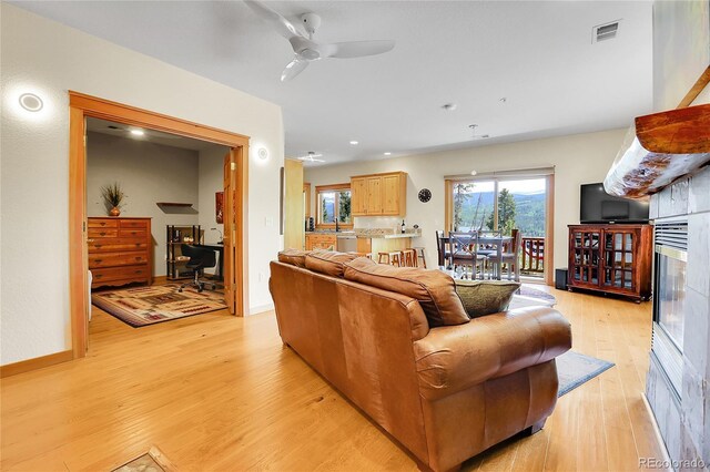 147 Forest Trl Unit 3, Winter Park, CO 80482 - living area with light wood finished floors, ceiling fan, and recessed lighting